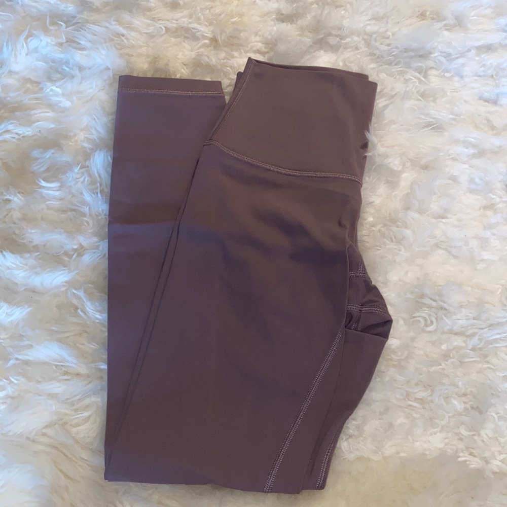 Light pink, Lululemon leggings size 4 Chinese new year edition
